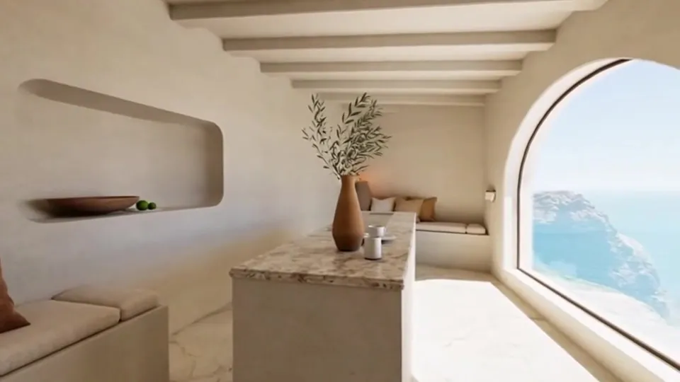 A pale plaster room with a stone-topped bar, built-in banquettes and an arched window to the sea.